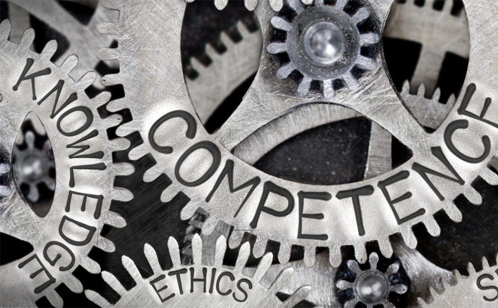 Gears with the words competence, ethics and knowledge